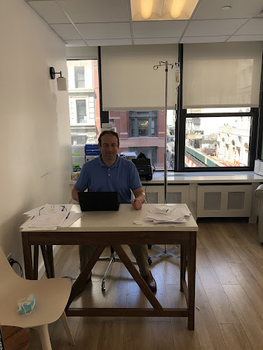 Dr. Neil Paulvin